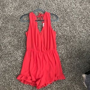 ASTR romper! Fun and bright color for summer!